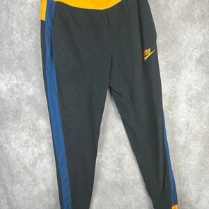 Nike Women's Black and Orange Fleece Joggers